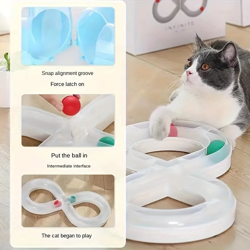 Blue and white plastic cat turntable track toy with balls and a feather teaser wand.