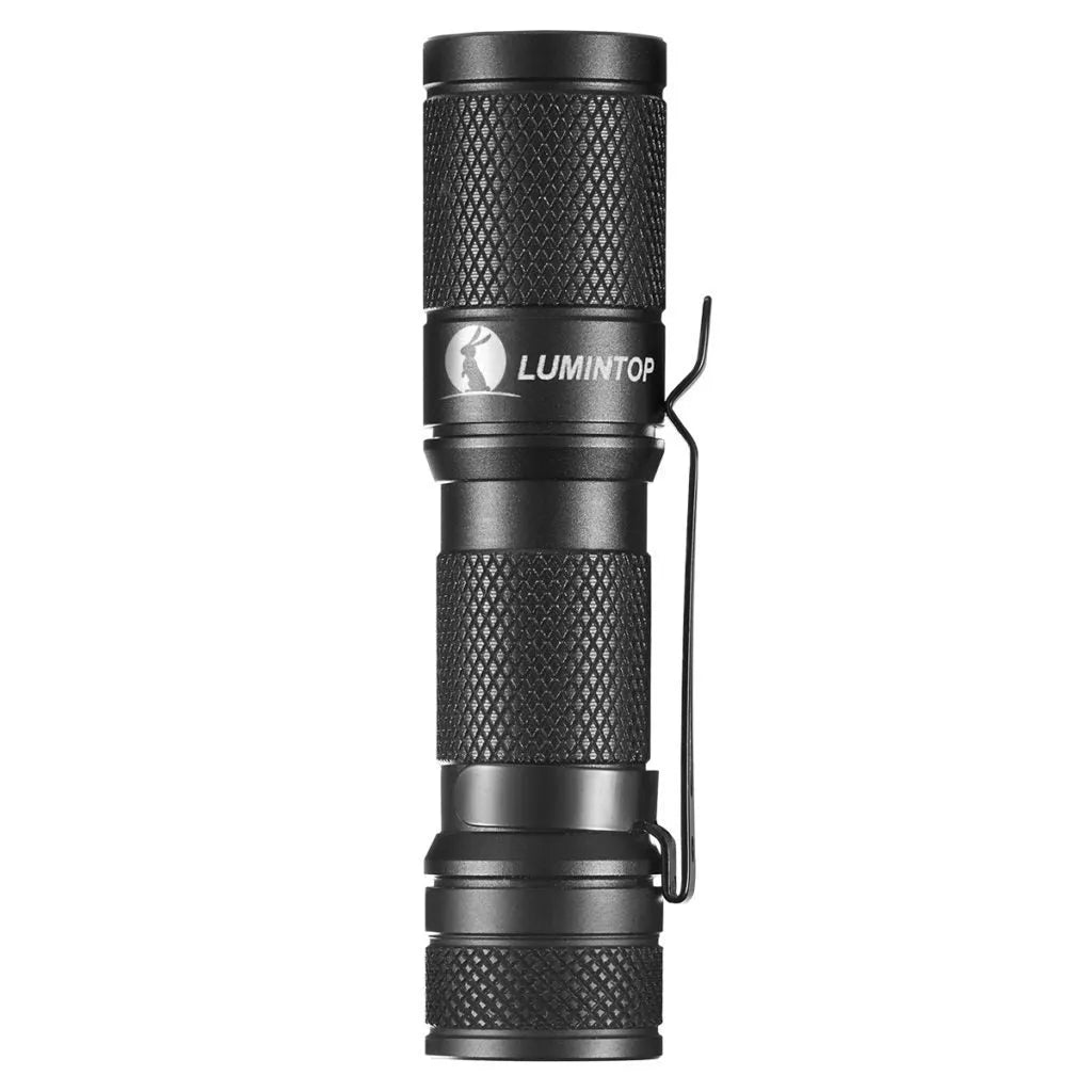 Black Lumintop Tool AA 2.0 aluminium keychain flashlight with magnetic tail cap and diffuser accessory.