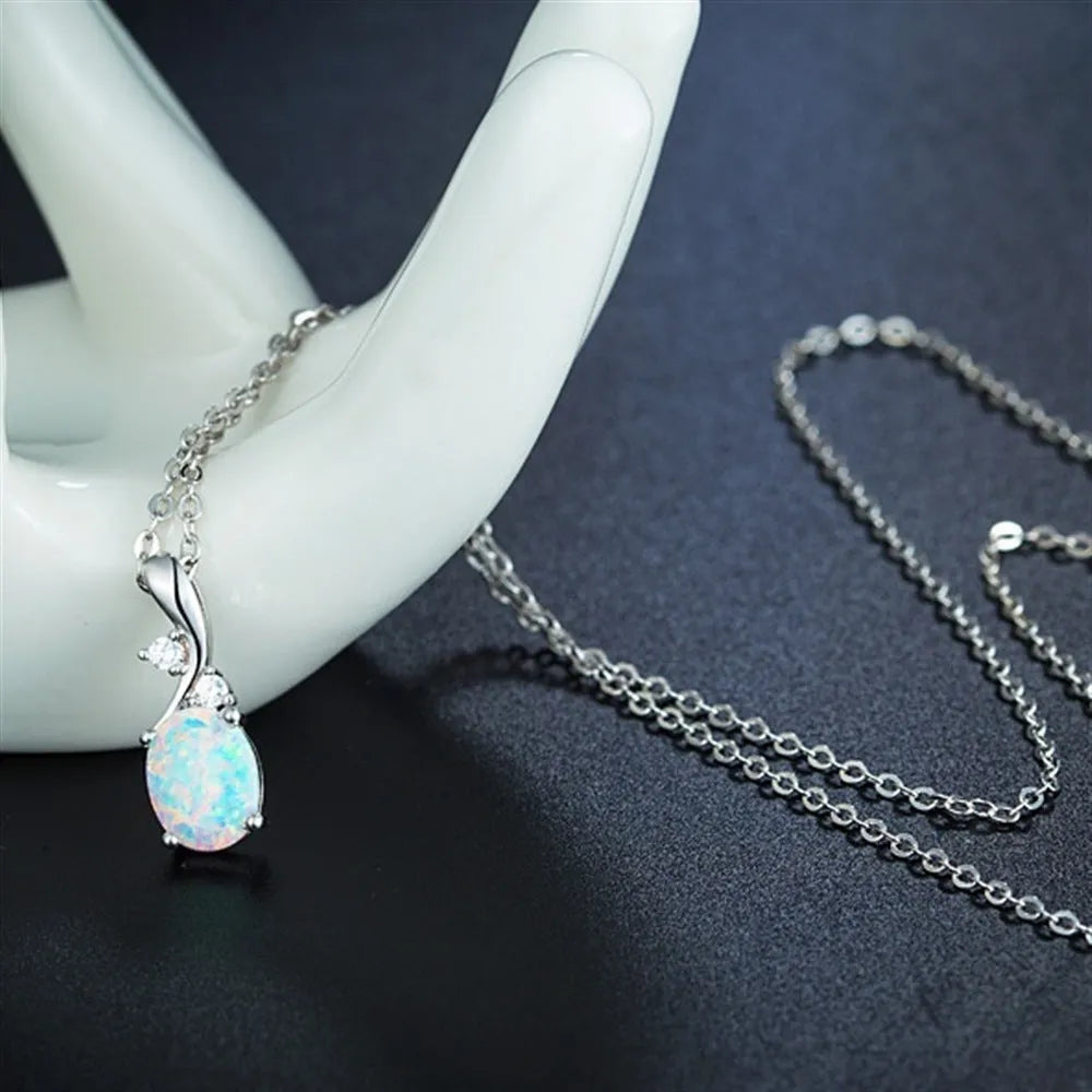 Water drop opal pendant necklace on adjustable O-chain in rose gold or white colour