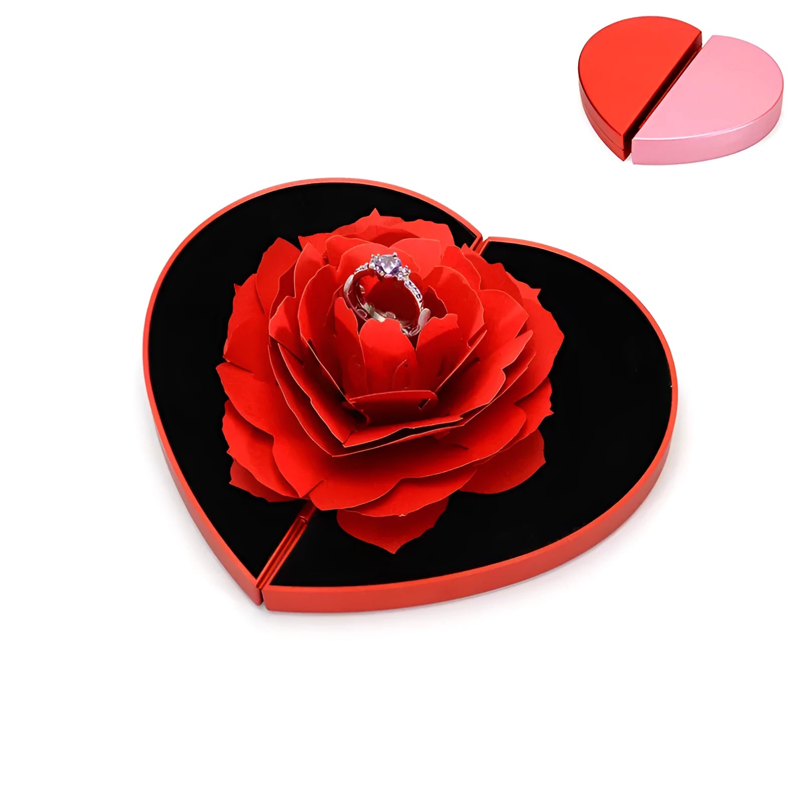Red heart-shaped plastic ring box on a white background, showing its rotating mechanism.