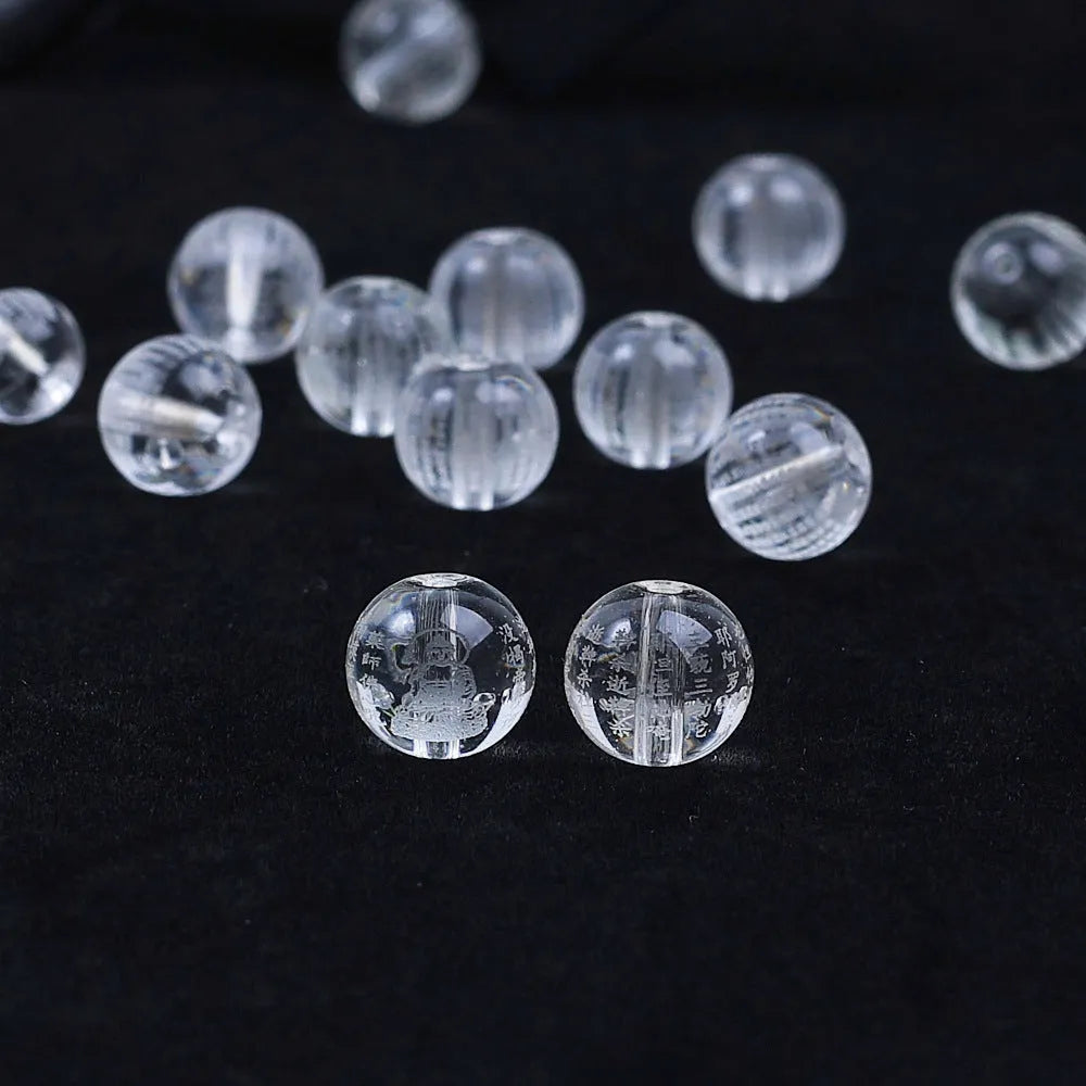 10mm glass Heart Sutra beads with polished surface showing clear script details
