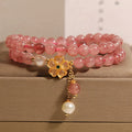 Women's double ring bracelet with strawberry quartz four-leaf clover design in Japanese Korean jewellery style