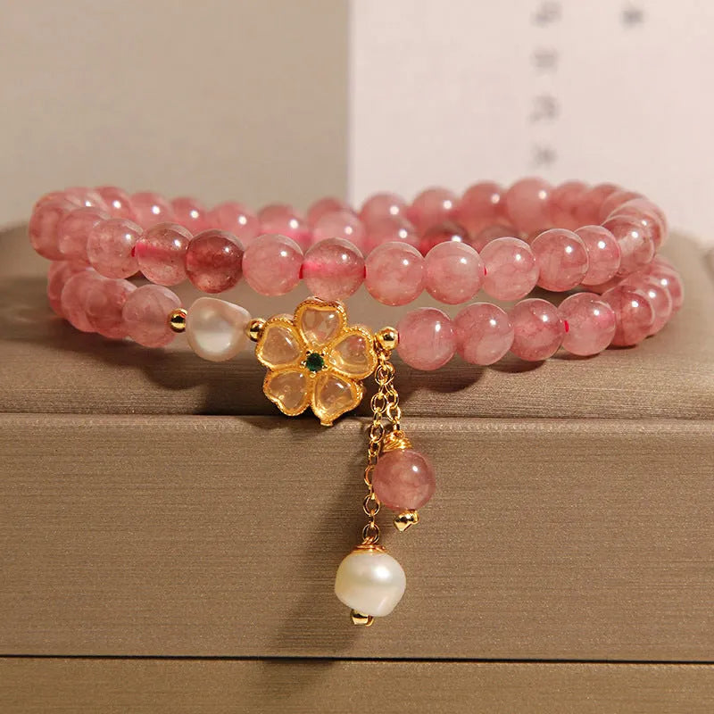 Women's double ring bracelet with strawberry quartz four-leaf clover design in Japanese Korean jewellery style