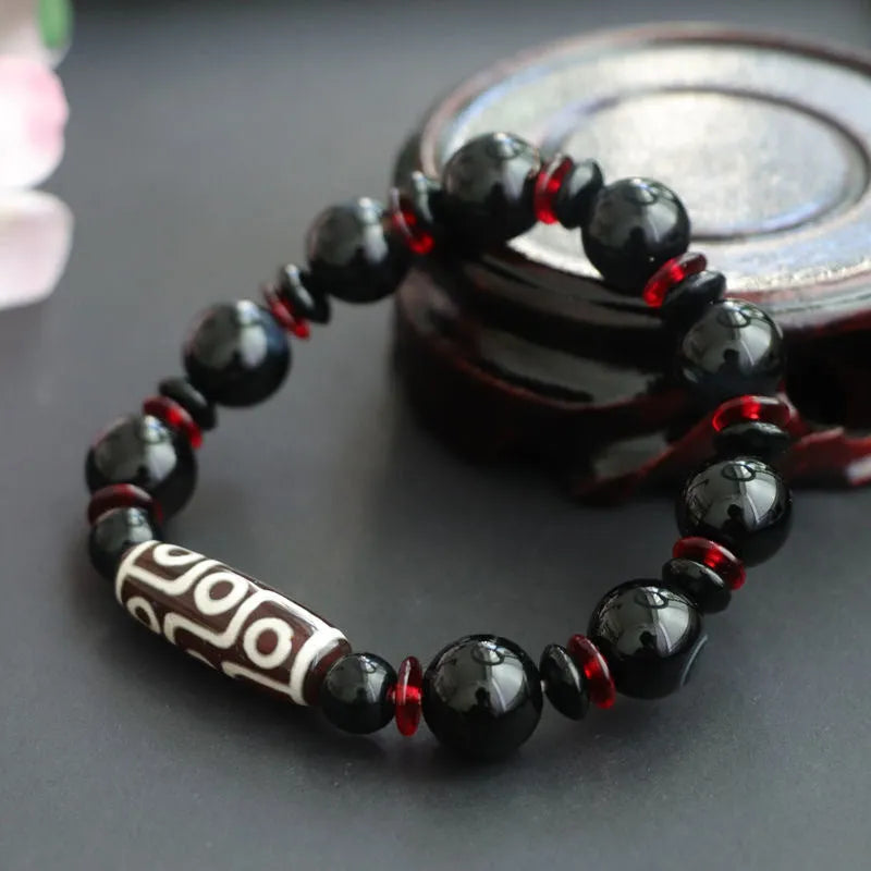 Hand-woven black agate dzi bead bracelet with 11mm geometric beads