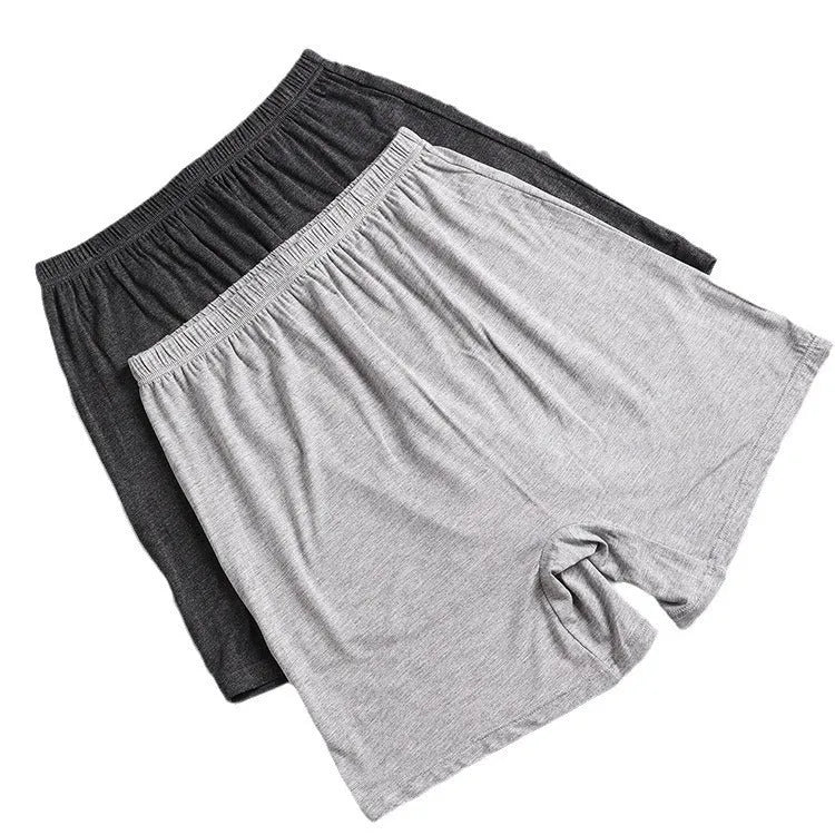 Men's solid colour modal boxers with a high waist, shown in black, blue, grey, and brown.
