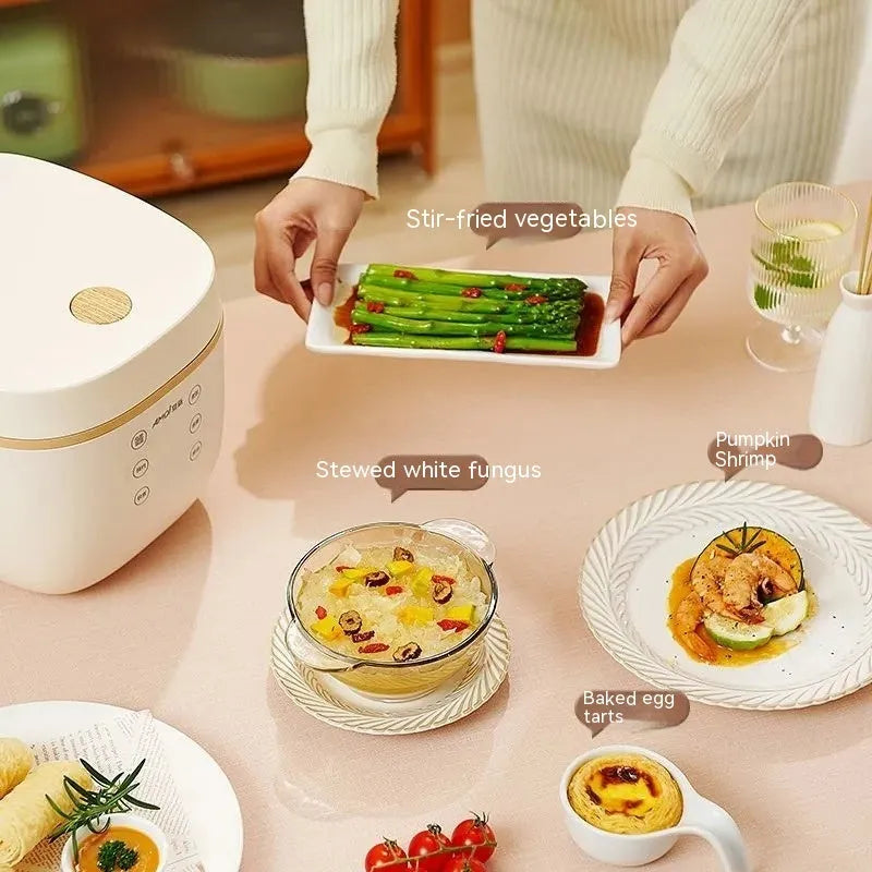 White intelligent rice cooker with black crystal inner pot and accessories