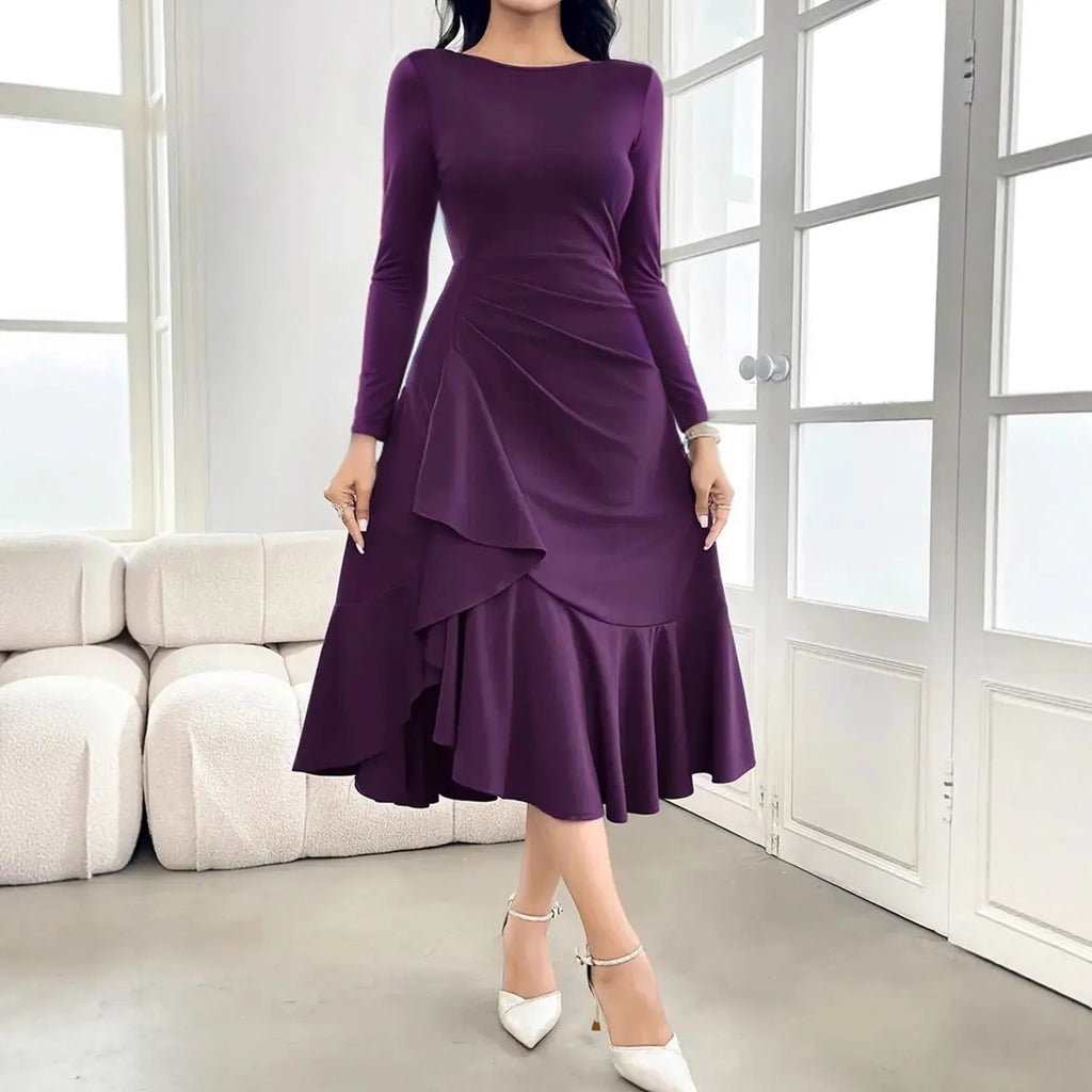Purple women's long sleeve pullover dress with a round neck and mid waist ruffles.