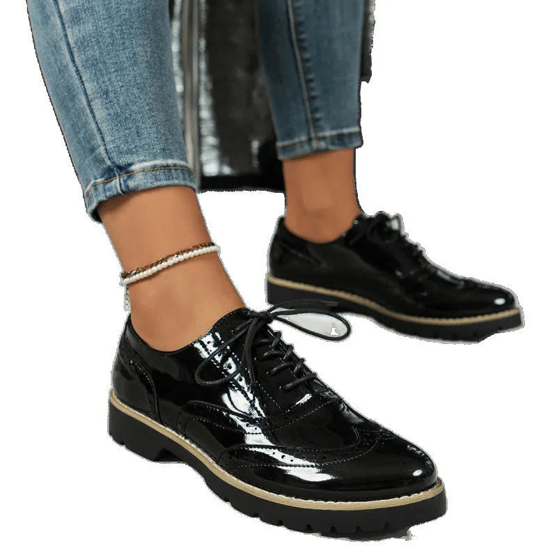 Women's black loafers with sequin details and wedge heel in oxford lace-up style