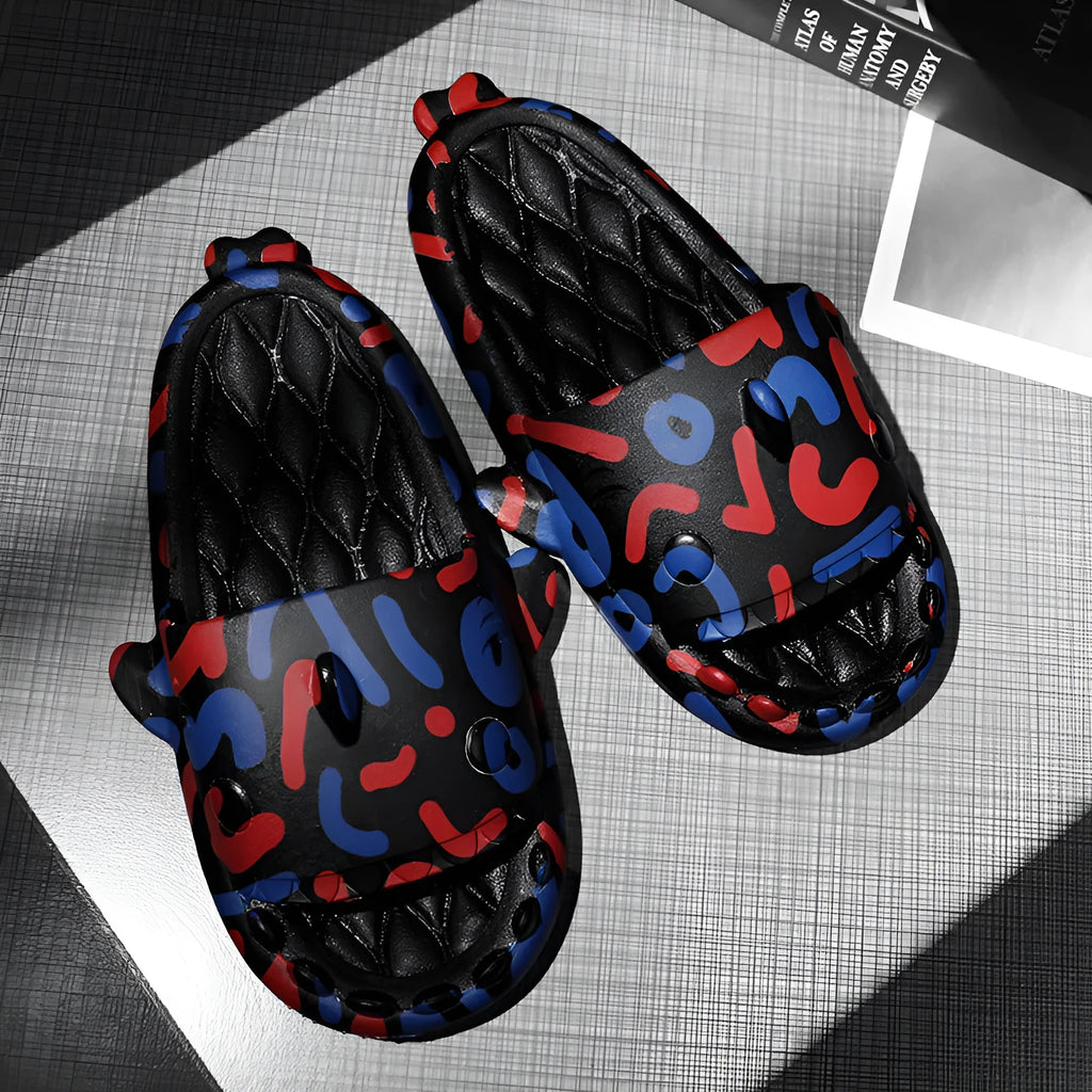 Shark-themed open toe slippers made from EVA material in beige, shown from a side view.