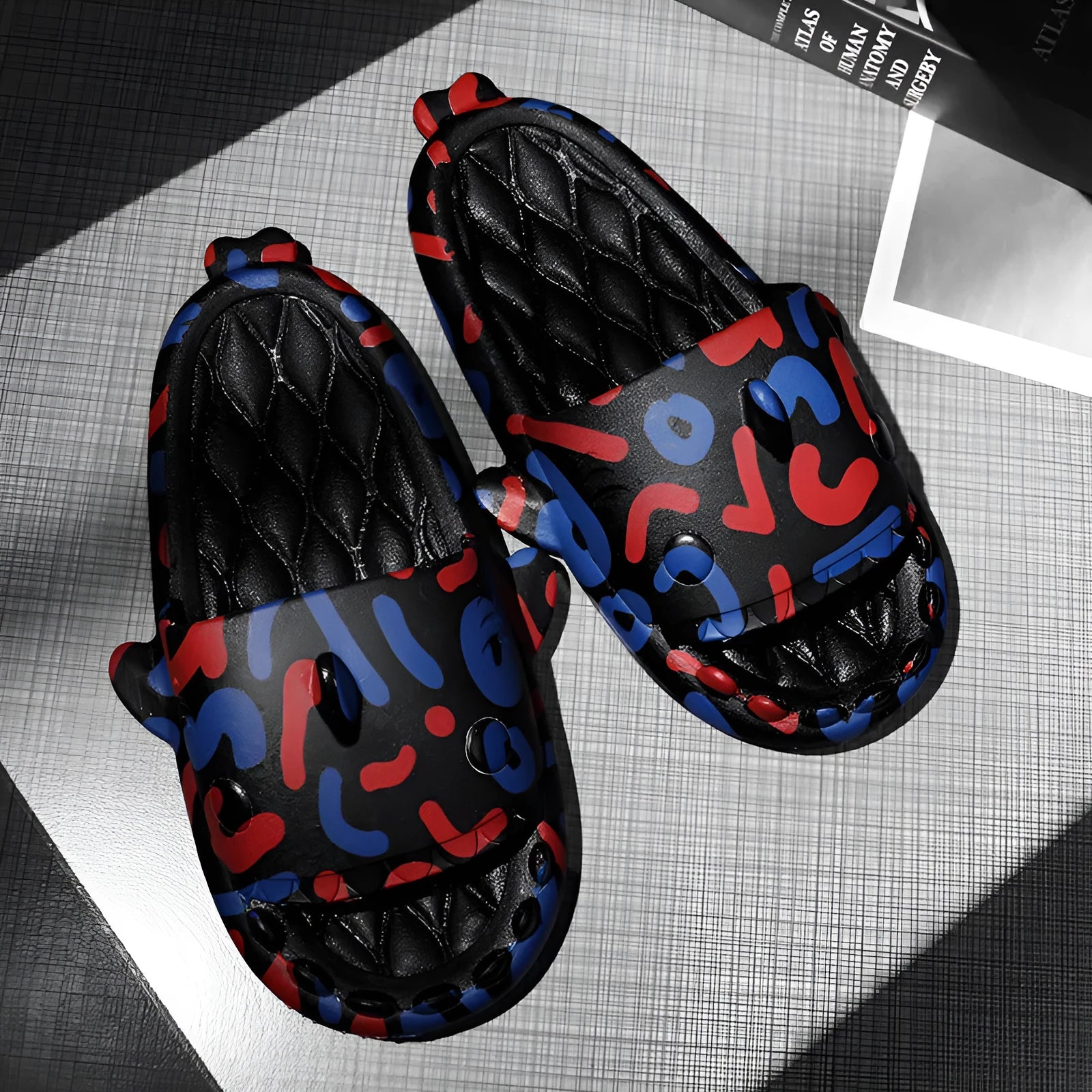 Shark-themed open toe slippers made from EVA material in beige, shown from a side view.