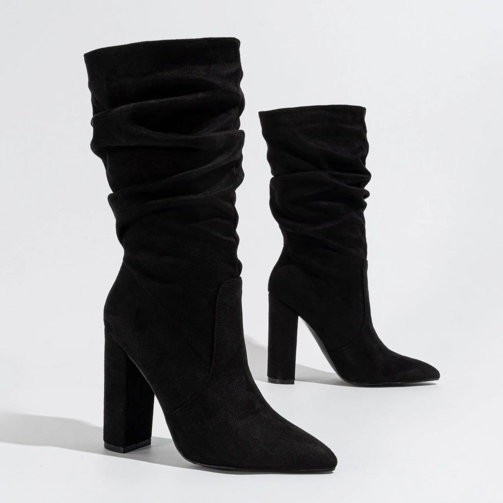 Women's black suede ankle boots with chunky high heel and pointed toe design