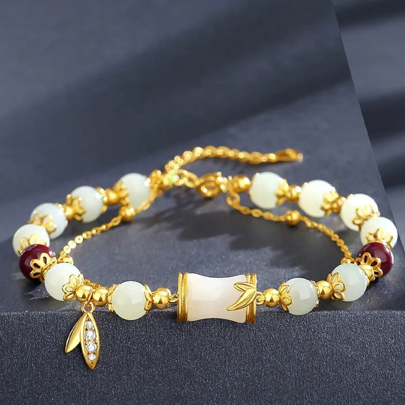 Retro style Ruyi floral bracelet made from coloured glaze and glass in beige, green, light green, or white.