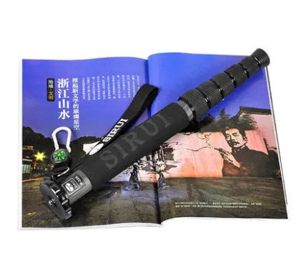 Black carbon fibre monopod for SLR cameras extended to maximum 1540mm height