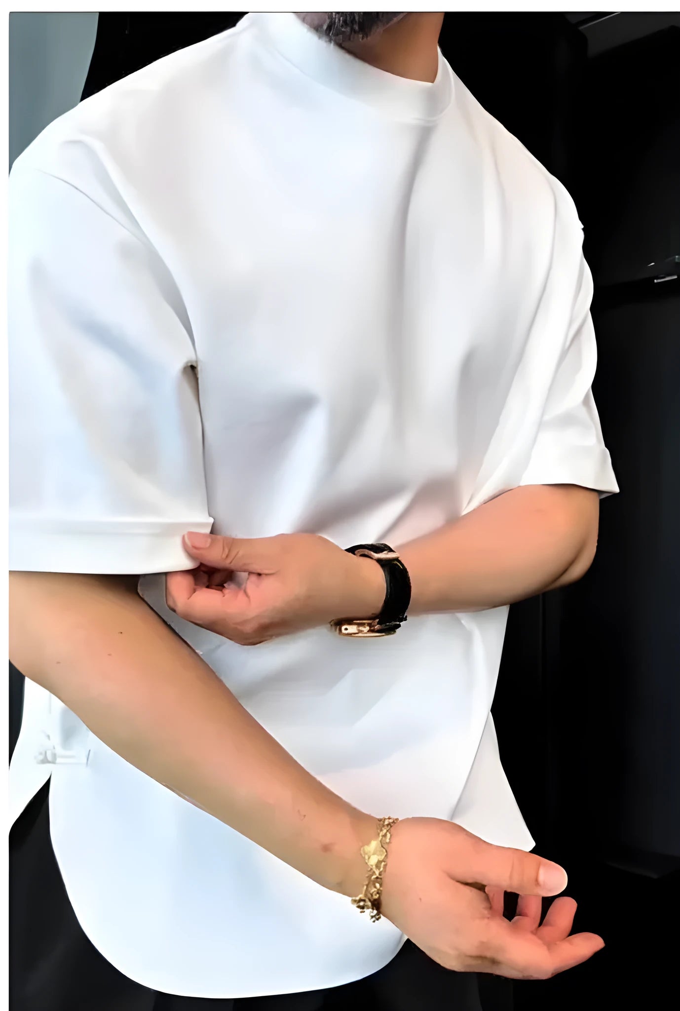 Men's white buttoned neck t-shirt with a round hem, shown in a regular fit.