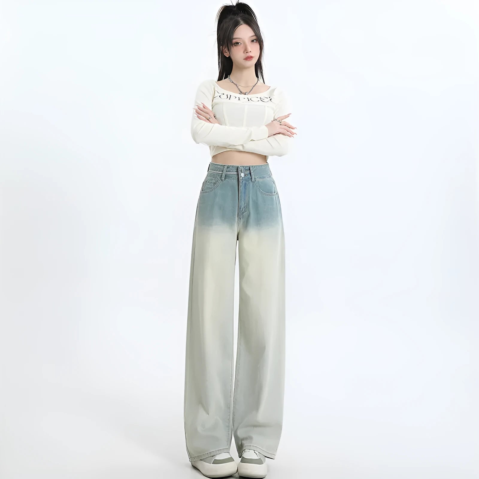 Women's gradient blue straight-leg denim trousers with wide leg fit on hanger