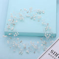 Bride's crystal pearl wedding hair band accessory in silver, gold, and rose gold colours with wired construction