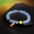 Women's aquamarine crystal bracelet with 8mm geometric beads in transparent iced blue colour