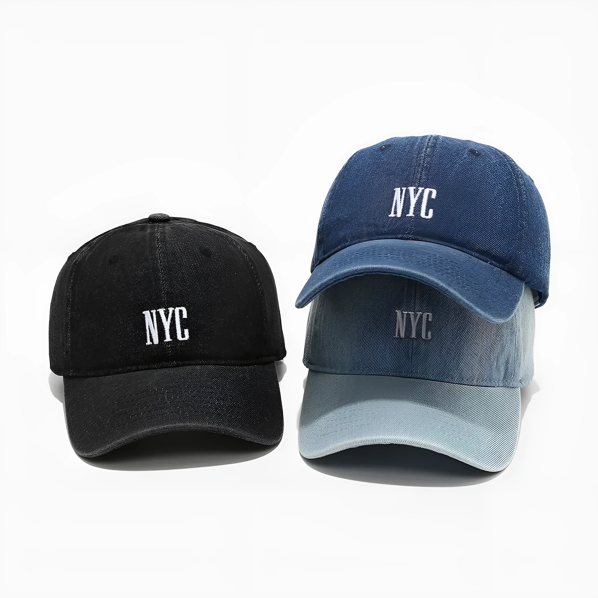 Light blue denim peaked cap with embroidered lettering on the front, showing adjustable strap.