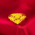 Gold openwork geometric flower ring with a textured alluvial pattern on a brass base.