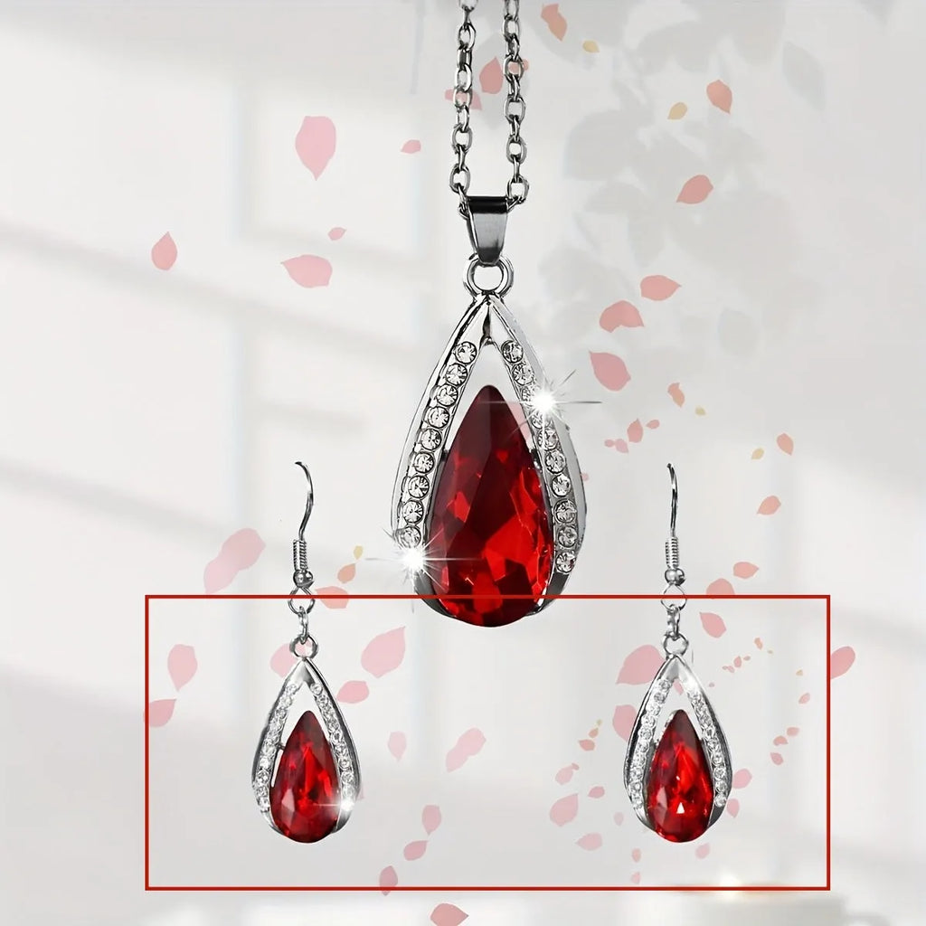 Alloy teardrop pendant necklace and matching earrings set in black or red finish.