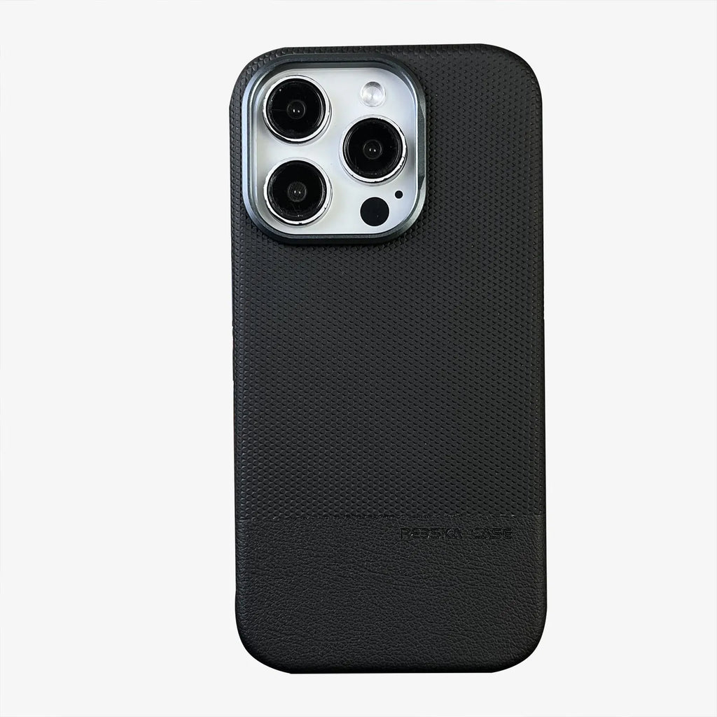 Black magnetic iPhone case with dragon scale texture and stitching, shown on an iPhone 15 Pro.