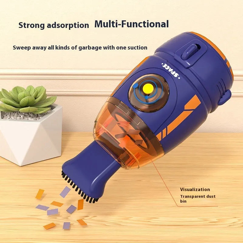 USB rechargeable handheld desktop vacuum cleaner in blue rocket design on office desk