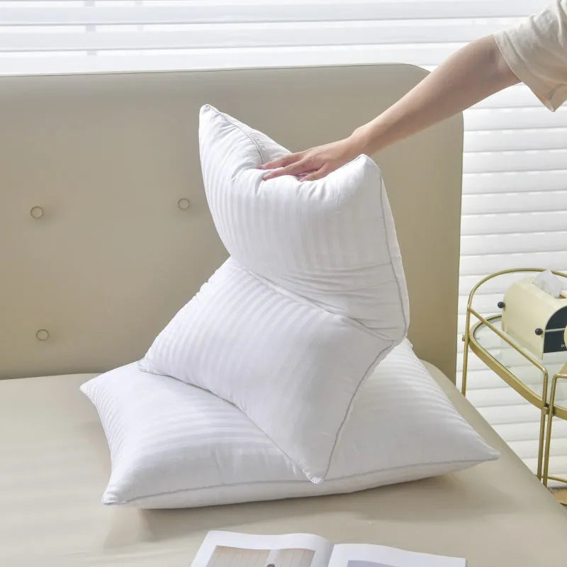 White cotton satin stripe pillow with feather and cotton filling in three loft weight options