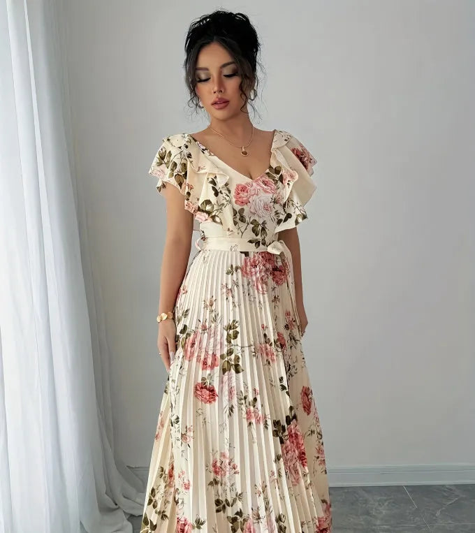 Apricot floral print V-neck dress with ruffled sleeves and a full swing skirt.