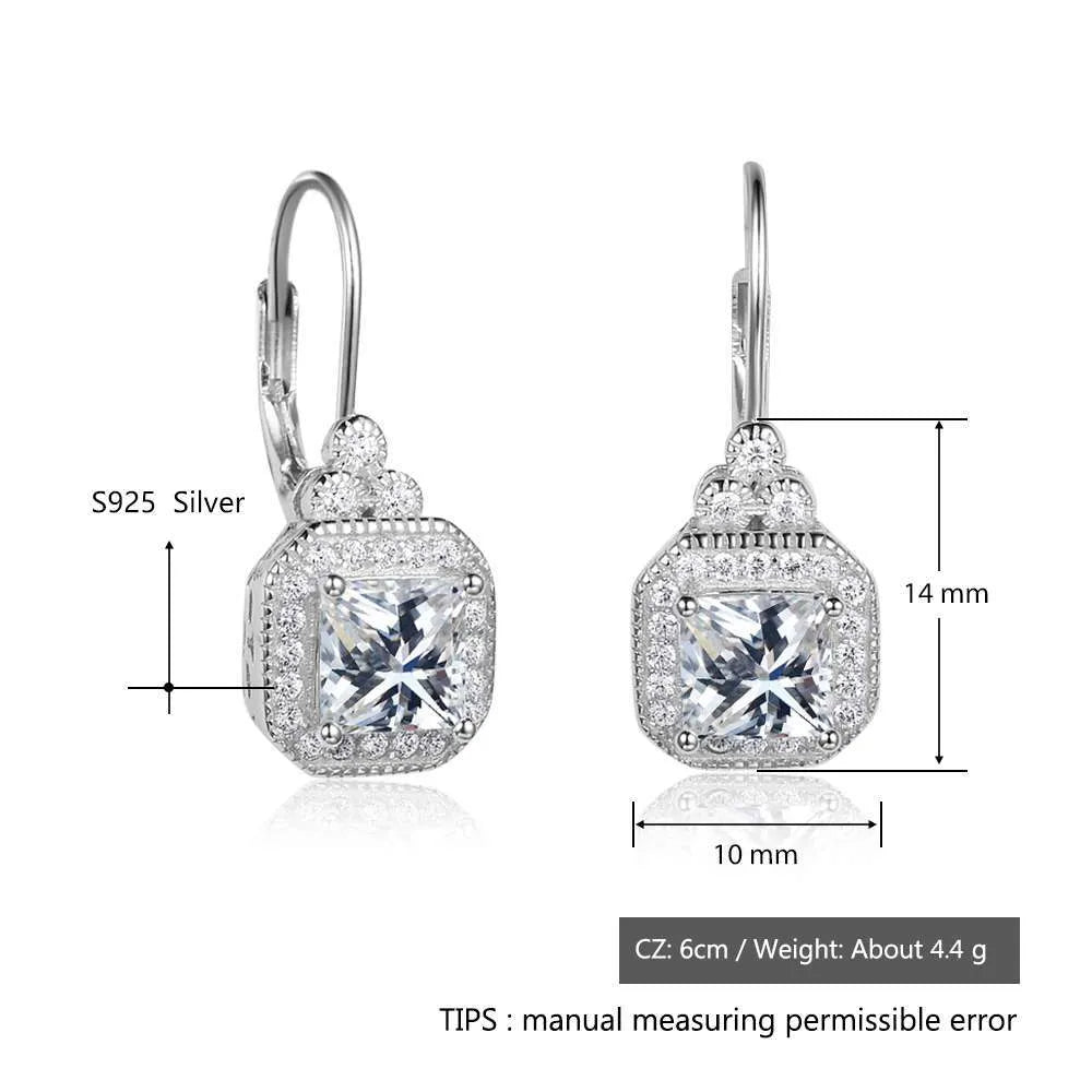 s925 sterling silver crown rhinestone earrings on a white background, polished silver finish with clear stones
