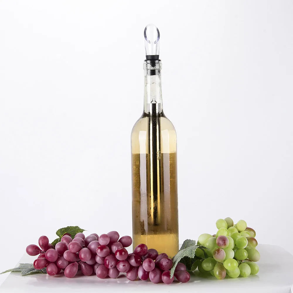 Stainless steel wine chilling rod with acrylic pourer, shown next to a wine bottle.