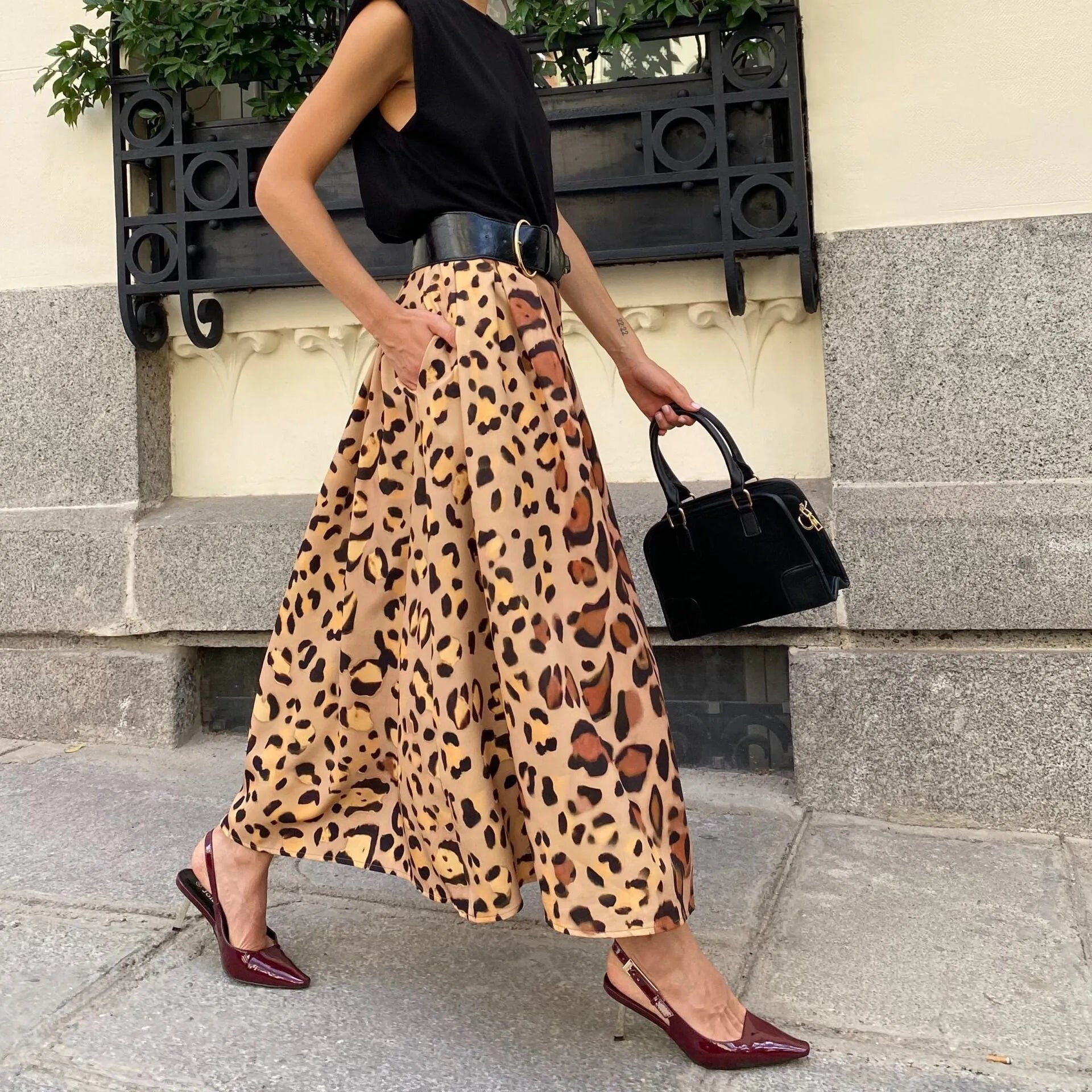 Brown leopard print women's A-line long skirt with big hem detail