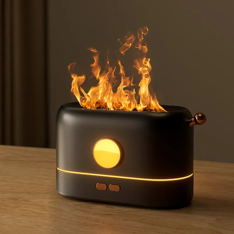 Black simulation flame USB humidifier with colour changing LED light on a desktop