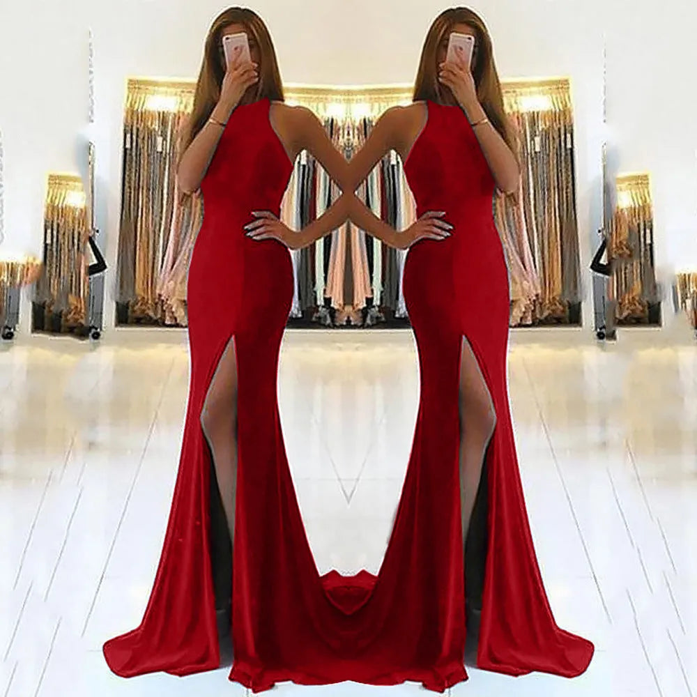 Red ladies long evening dress with hollow detailing, a high waist, and a large swing skirt