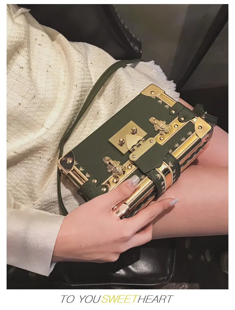 Hard PU leather women's shoulder bag with flap design and crossbody strap in black or green