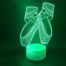 3D ballet dancer silhouette LED night light with remote control on a bedside table