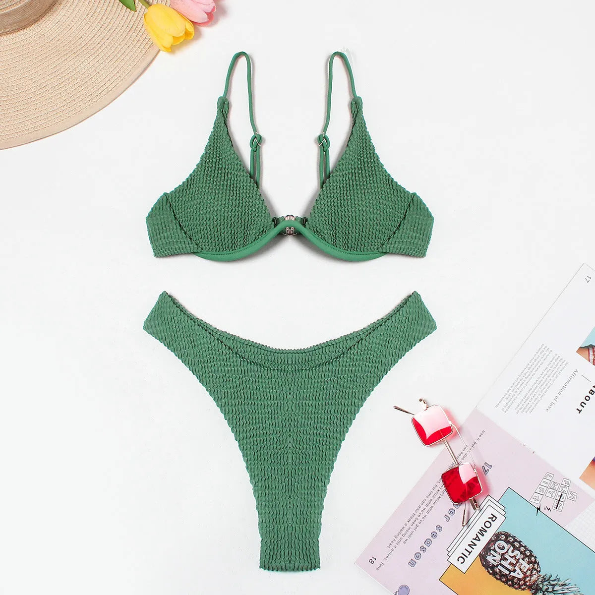 Green women's bikini swimsuit with ruffle detail and split-style briefs