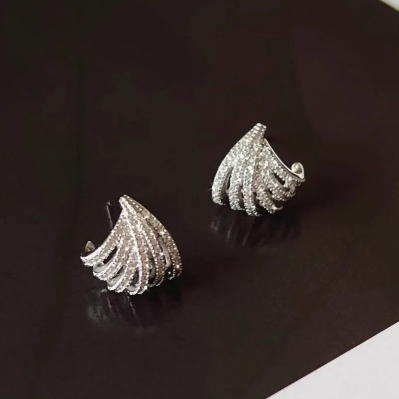 Women's geometric line design earrings with platinum electroplating and zircon construction