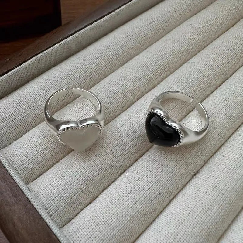 Adjustable S925 sterling silver ring with black agate heart design