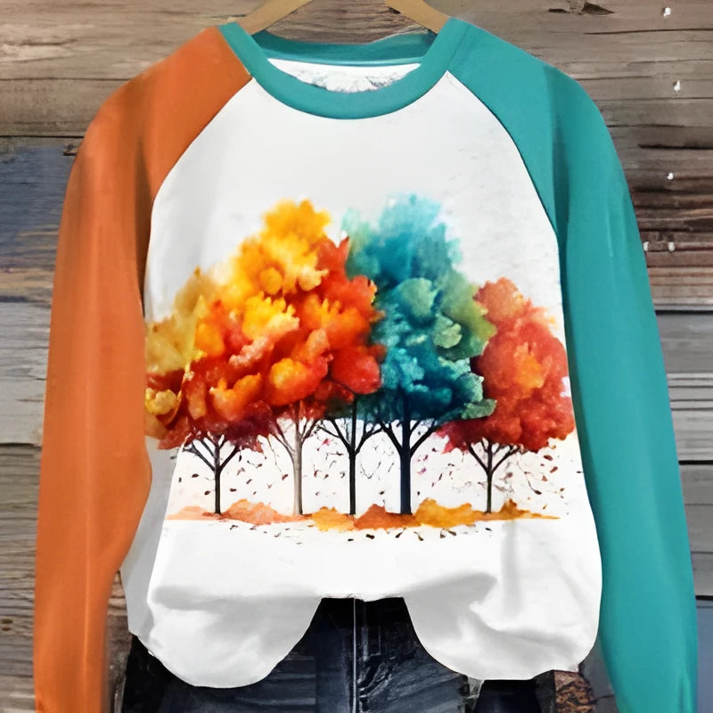 Green women's hoodie with a bold 3D cartoon character print on the front, long sleeves.