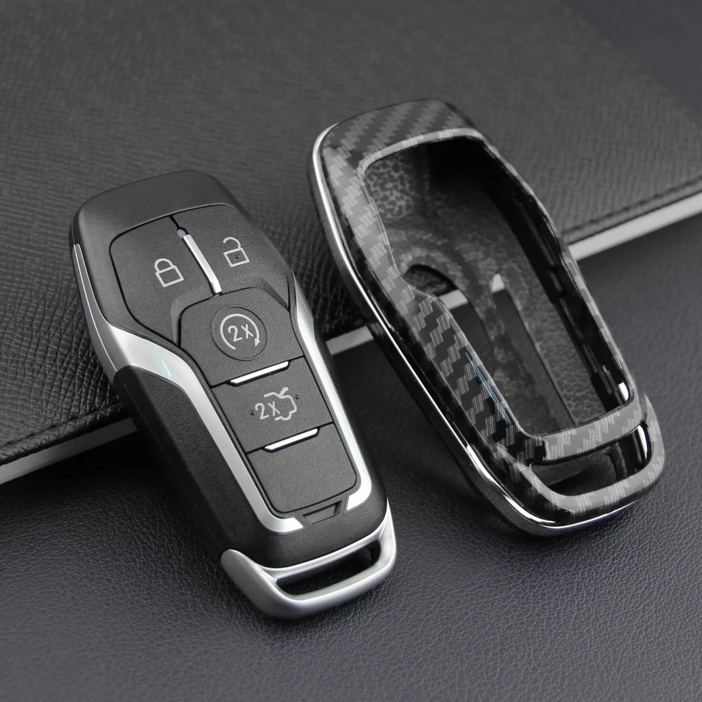 Plastic protective shell for a car key remote, shown in single-shell and buckle versions.