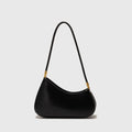 Oval-shaped brown PU leather women's underarm handbag with a single shoulder strap and visible stitching.