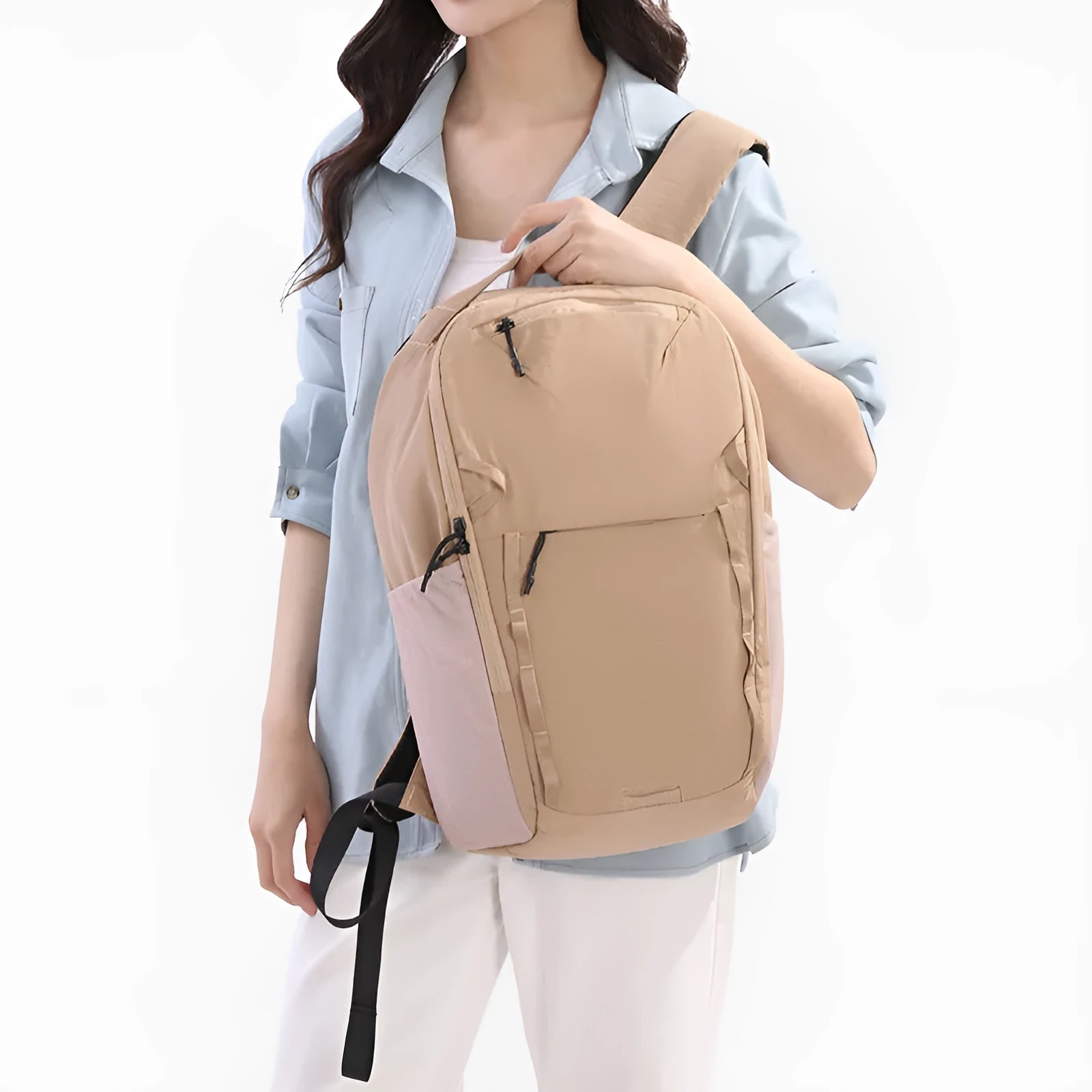 Waterproof Taslan composite cloth backpack with curved shoulder strap in solid colour.