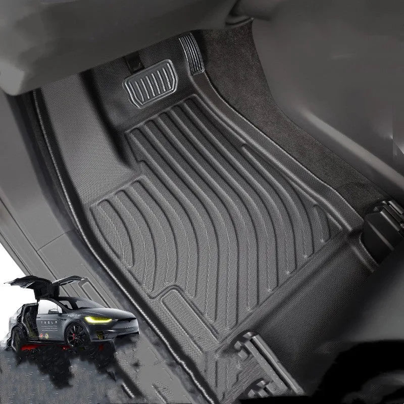 Custom-fit TPE rubber floor mats and boot liner for a left-hand drive Tesla Model X interior.