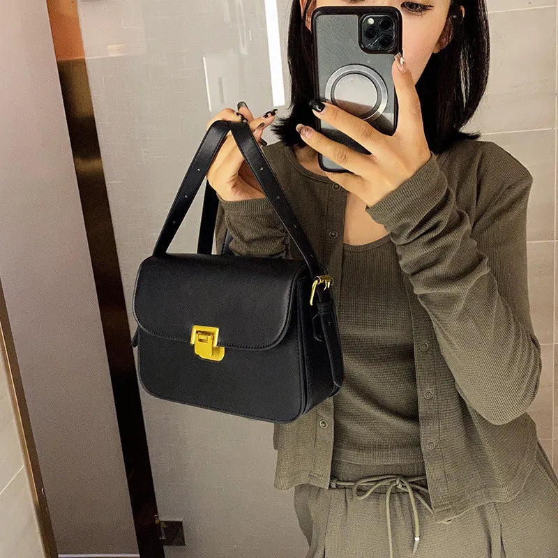 Soft PU leather women's small square shoulder bag in black with one-shoulder underarm carry design