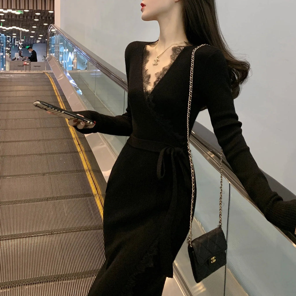 Black women's slim-fit woolen skirt in a princess dress style on a hanger.