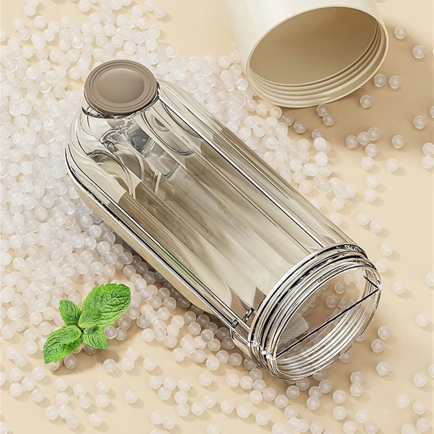 Beige foldable dog water bottle and food dispenser with leak-proof design for outdoor use