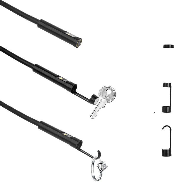 F300 wireless endoscope with dual camera probes, hook, magnet, and charging cable on a grey background.