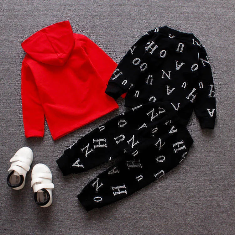 Children's long sleeve clothing set in red or white colours made from polyester and vinylon blend fabric