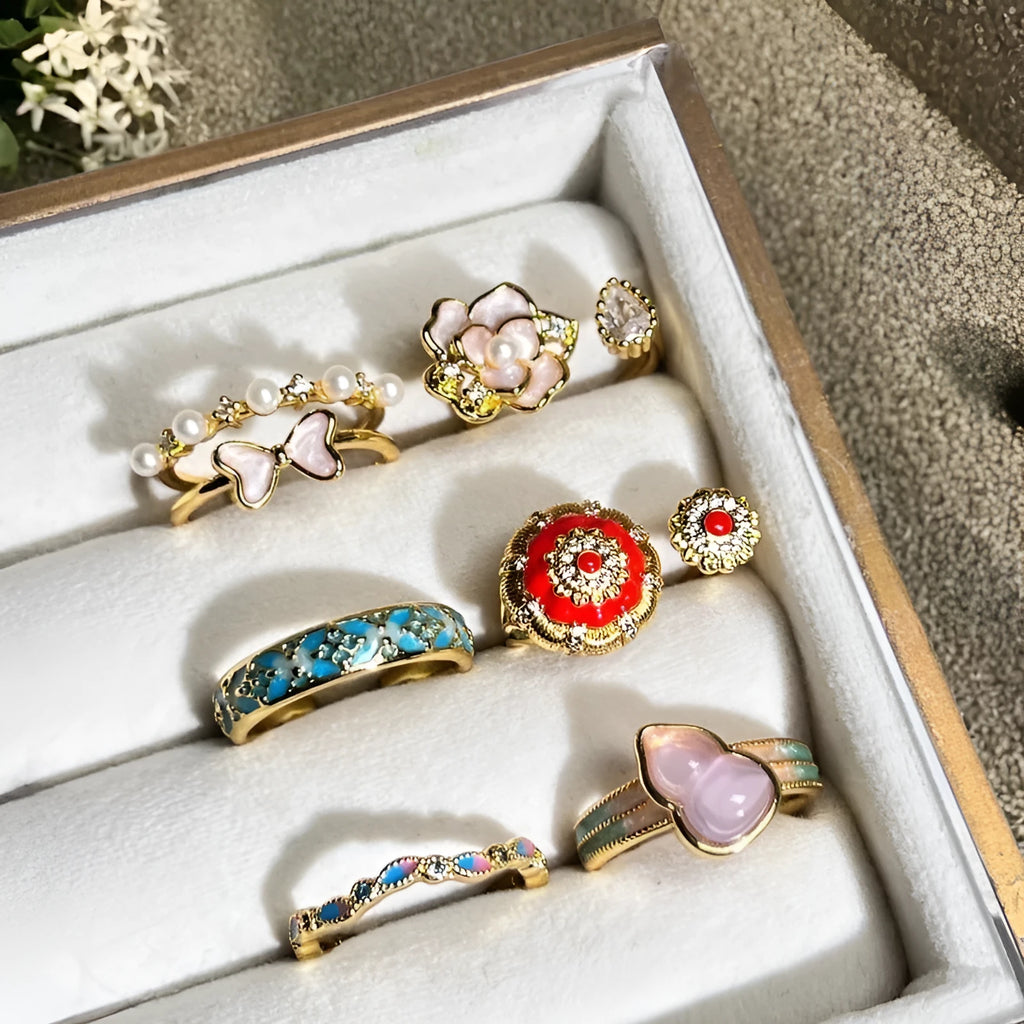 Adjustable copper gourd ring with inlaid zircon stones in New Chinese style featuring floral and bow designs