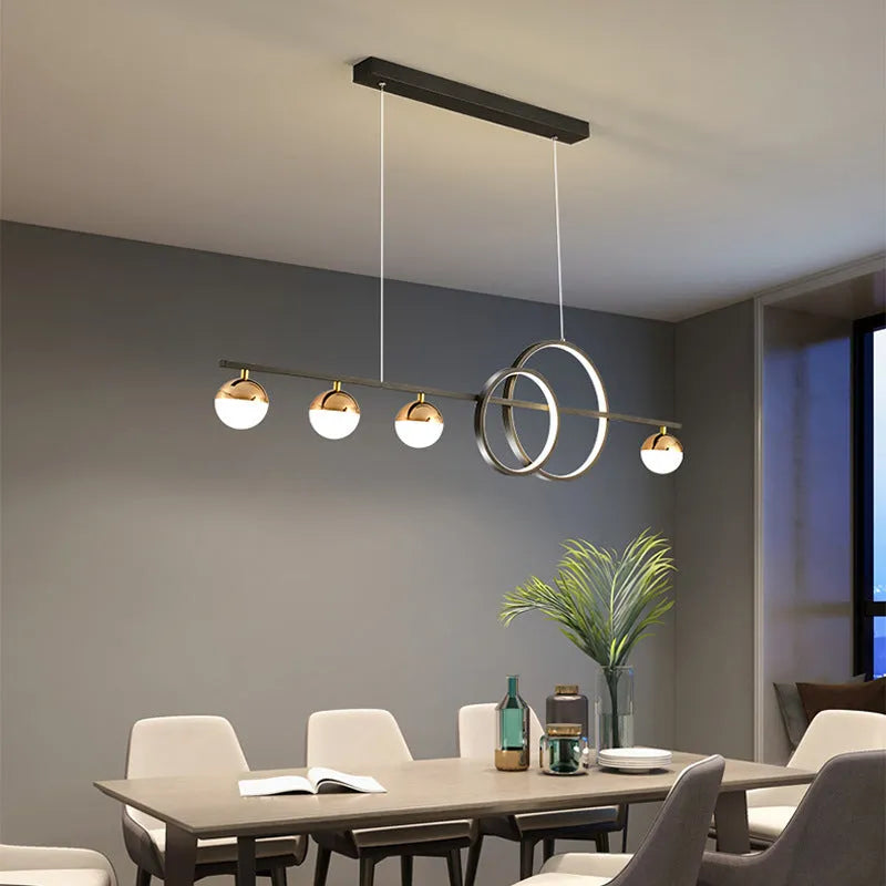 Rectangular black aluminium ceiling lamp with remote control for dimming.